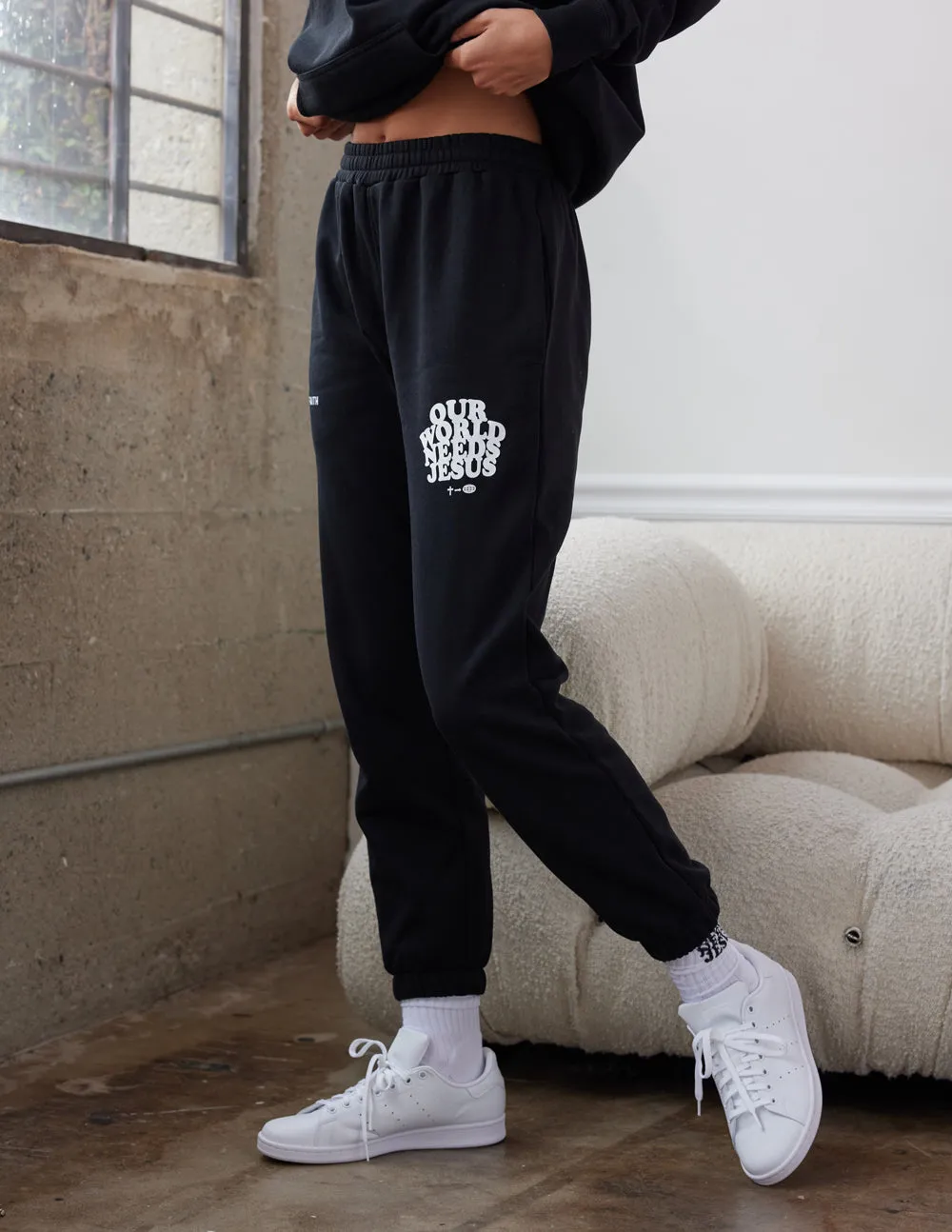 Our World Needs Jesus Black Unisex Sweatpant