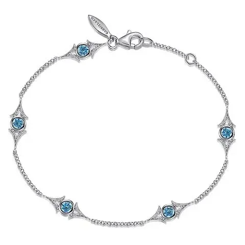 SS 7 0.66ctw Blue Topaz Station Bracelet